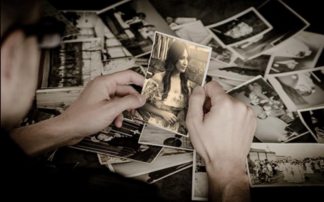 Mock-up of a guy holding Old Photo