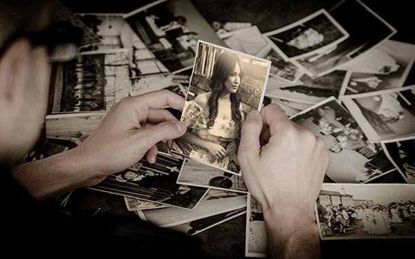 Download Mock-up of a guy holding Old Photo 